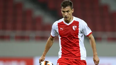 A photorealistic image of a young, anonymous Dinamo Zagreb player in a red and white jersey, with a white shirt and red...